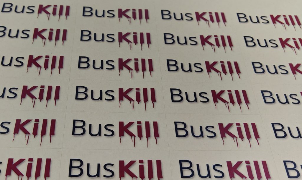 Photo of many BusKill stickers